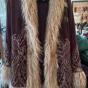 Elegant Burgundy Coat with Faux Fur Trim. Perfect condition, worn only once.